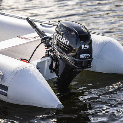 Suzuki 15 HP Black Tiller On Dinghy Diagonal