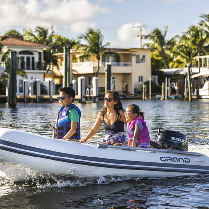 Suzuki 30 HP Black Tiller in Use on Dinghy